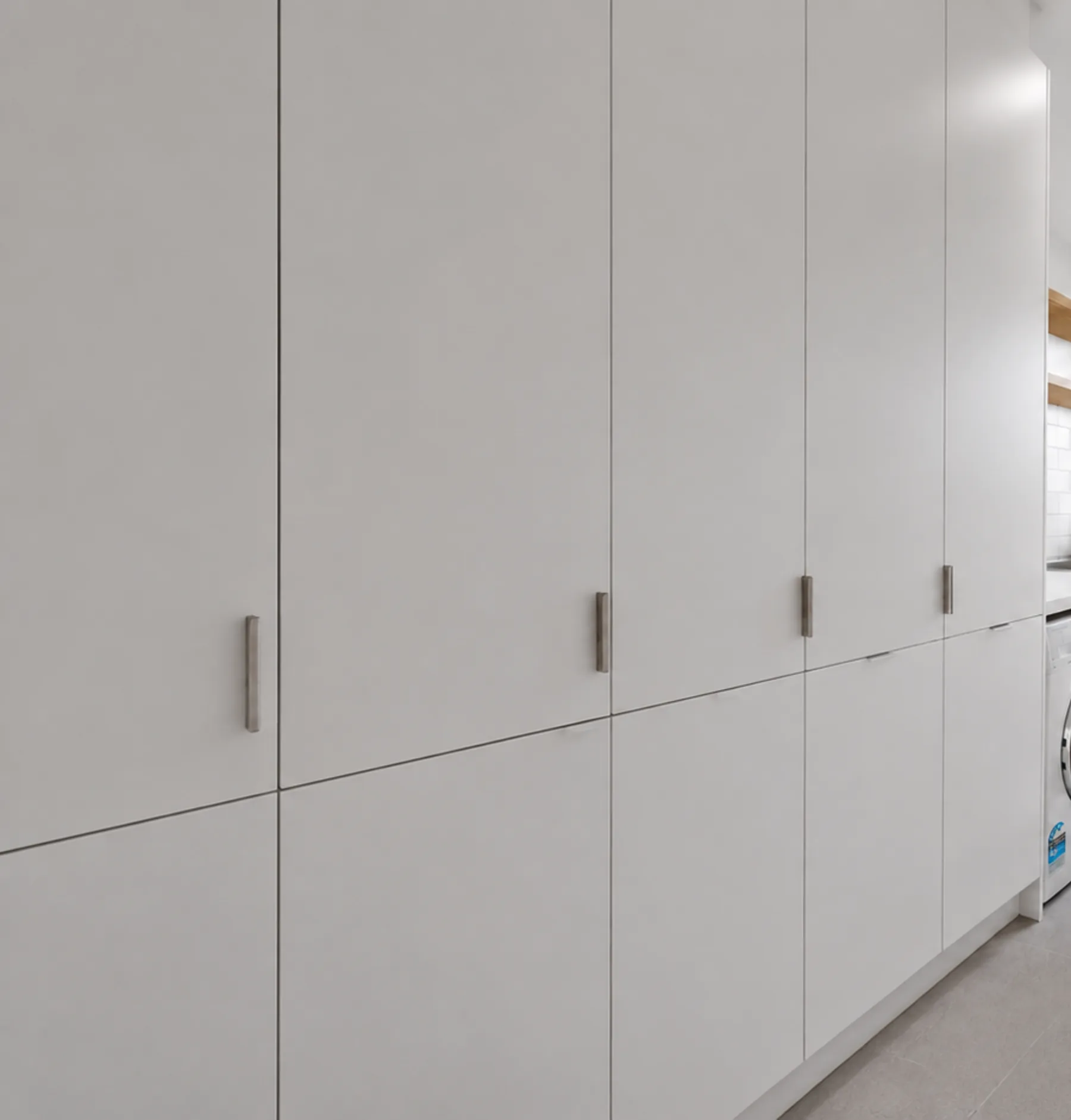 Custom laundry joinery in a completed Iconic Built renovation