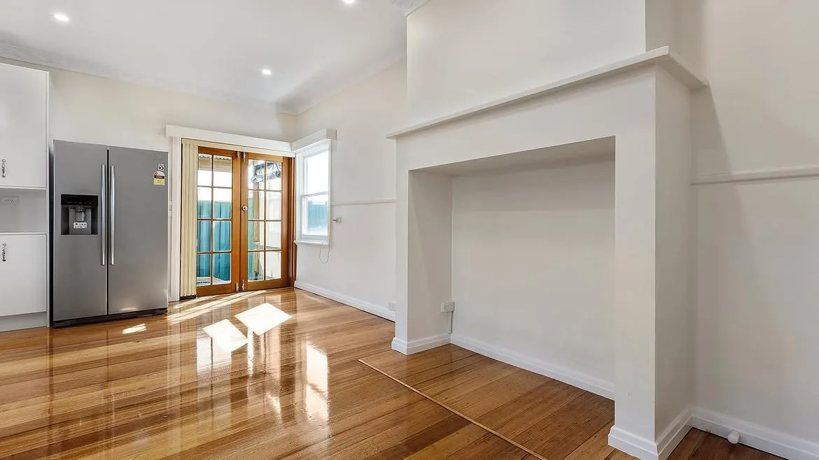 Open living area with restored fireplace, Pitman