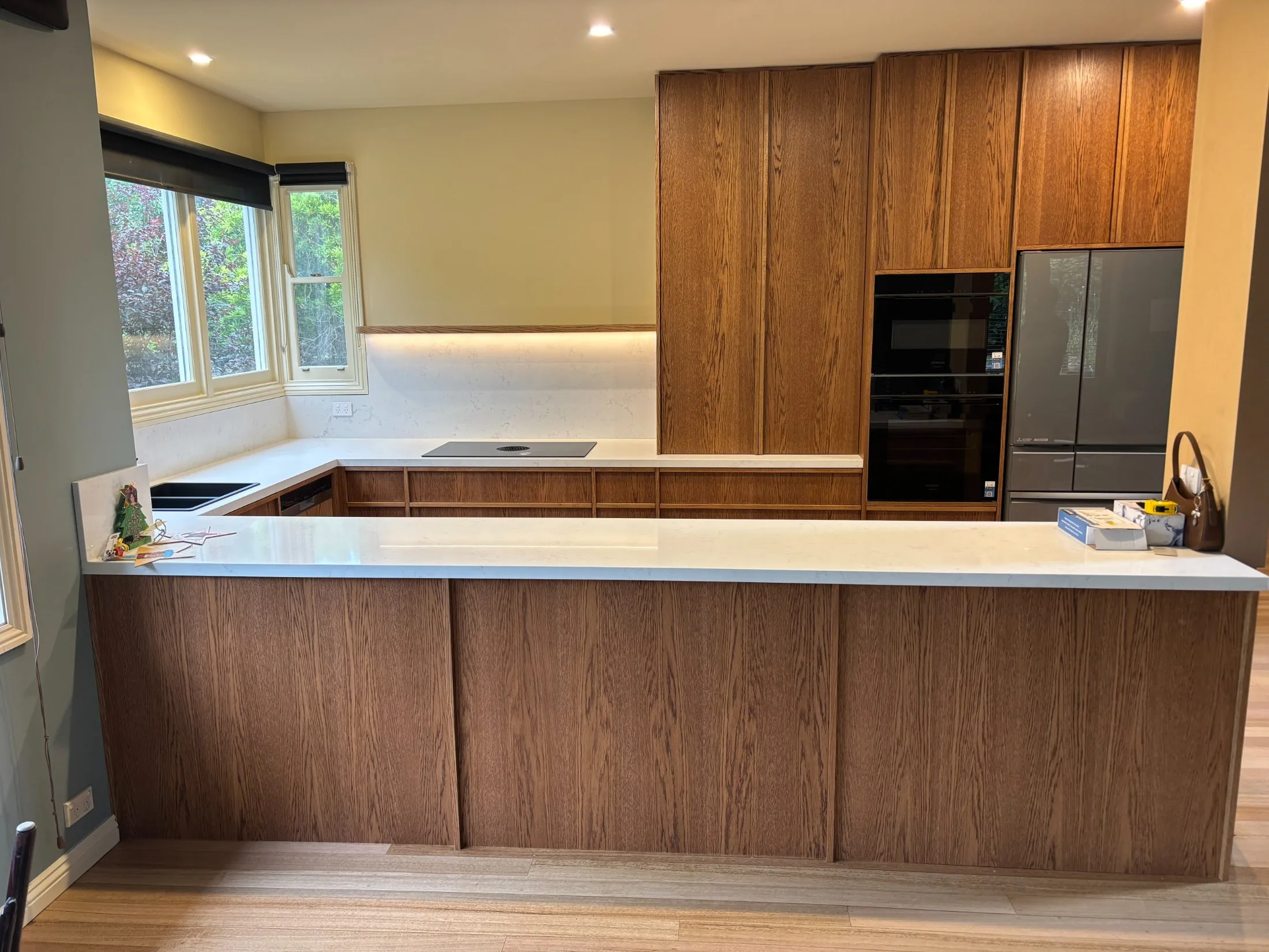 Riverview, Belmont — timber grain kitchen with stone benchtops